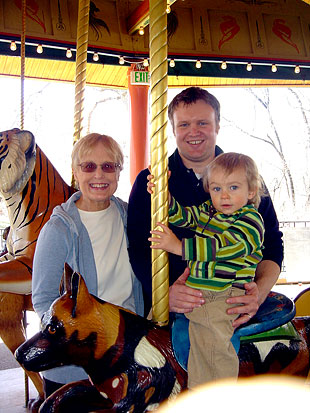 Marcia at the zoo with her son and grandson.